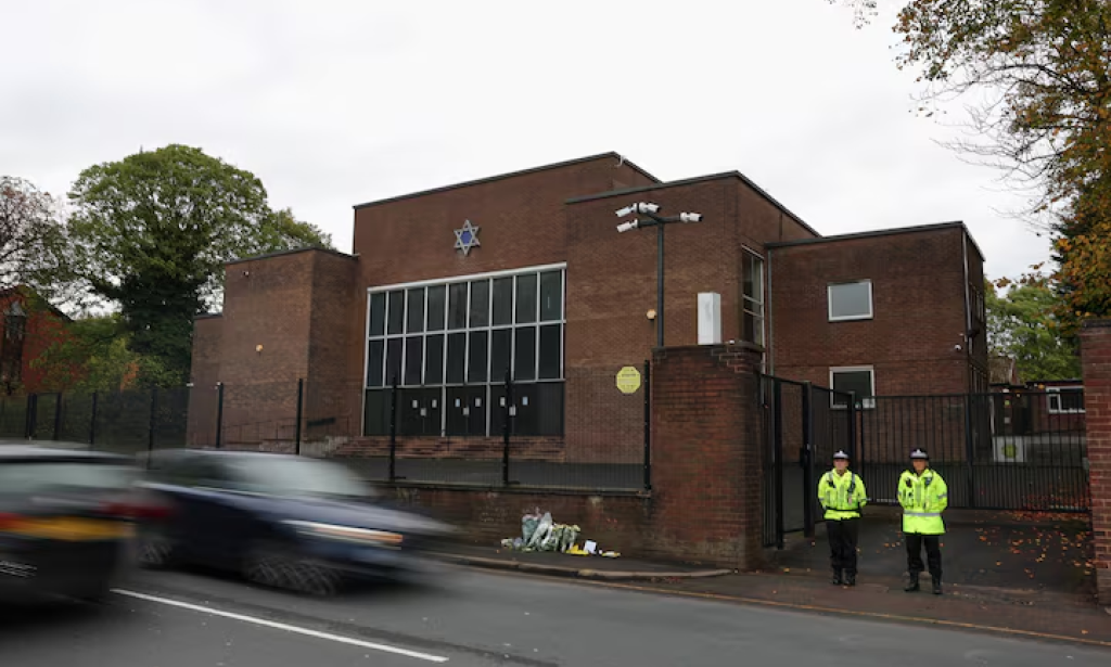 UK police charge 31-year-old man linked to Manchester synagogue attacker